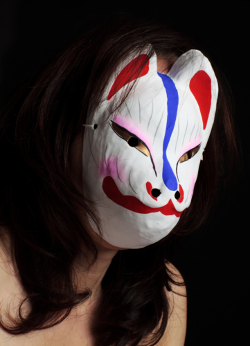 The woman wearing a mask of Fox