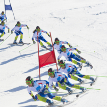 Multiple image of young women during the giant slalom