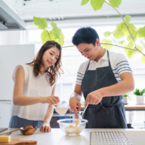 Young couple baking together in the kitchen